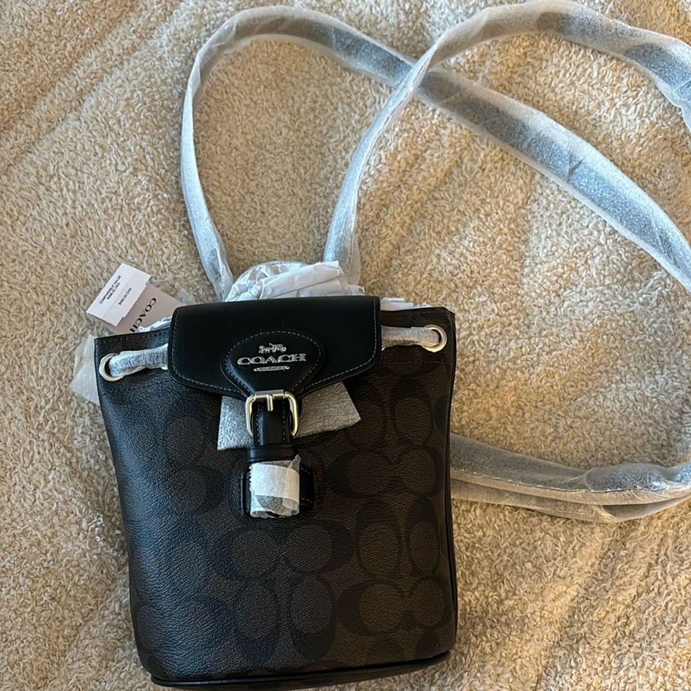 Brand new mini coach backpack. Never used!